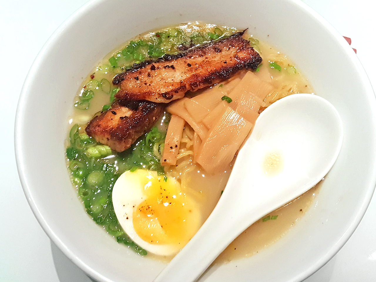 The kurobuta tonkotsu features pork belly, menma, egg and scallions for $14. The kurobuta tonkotsu features pork belly, menma, egg and scallions for $14.