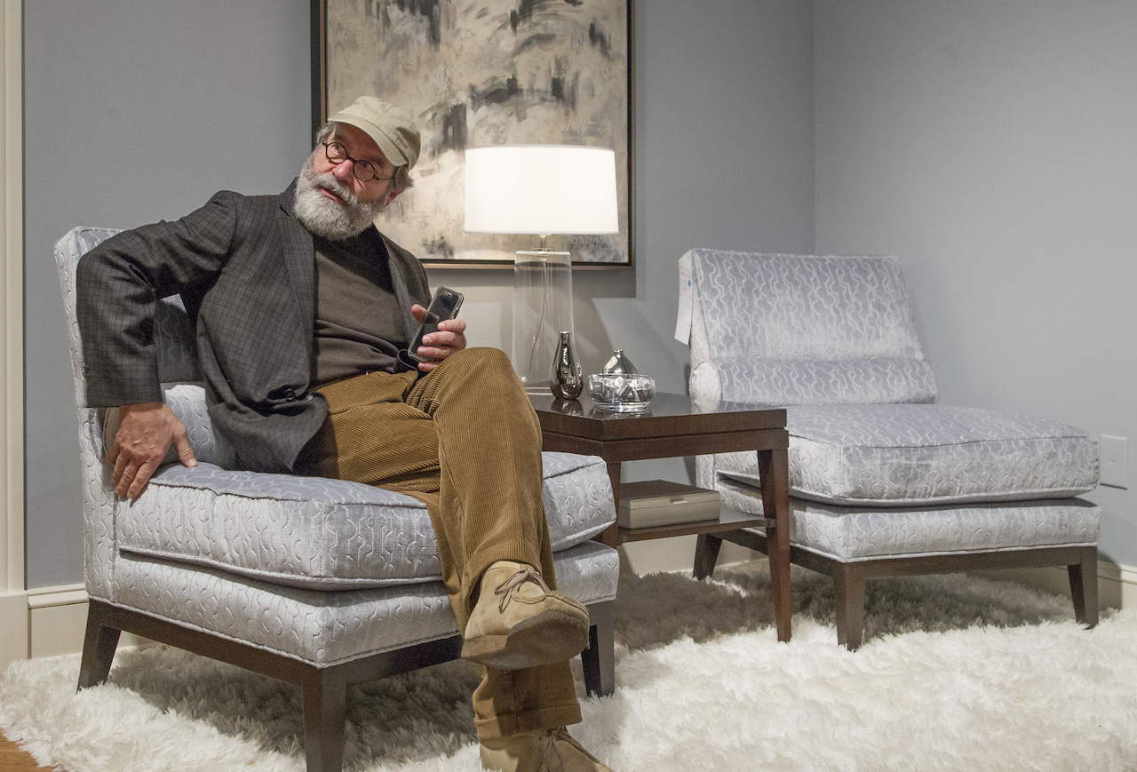 ...and sits on every chair or couch he's considering for his store. ...and sits on every chair or couch he's considering for his store.