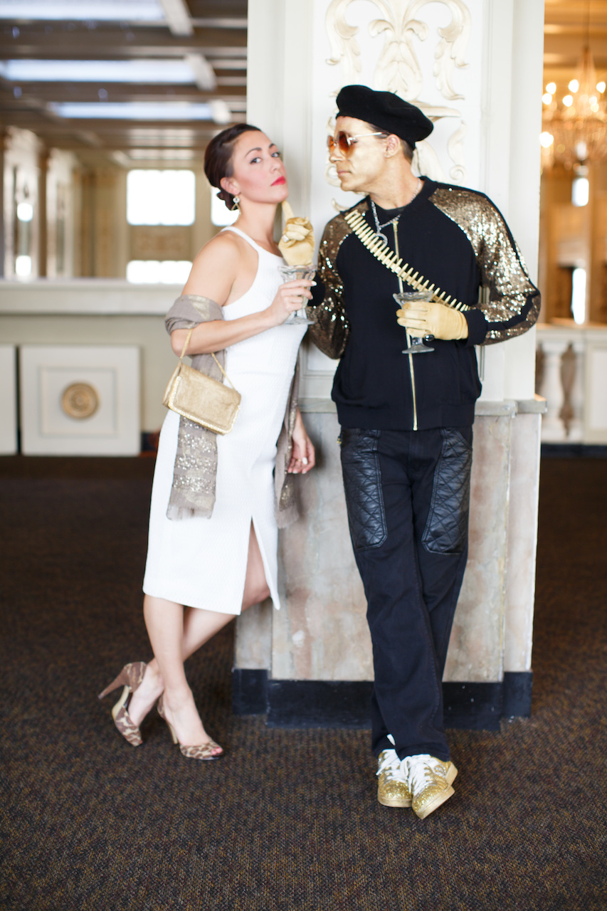 Lea's gold accents complement Eloise's golden hues! Lea sparkles in this ensemble from Betty Hays:Shilla white dress, $179; Tolani taupe/gold wrap, $109; Lixenberg gold handbag,$298 and Kim Gambrell earrings, $79.00.