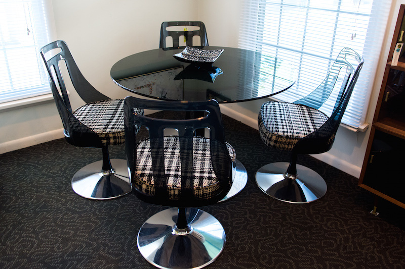 these look like dark ghost chairs-dark but translucent Repurposed Modern: A Mid Century Modern Treasure Chest Right Here in Louisville