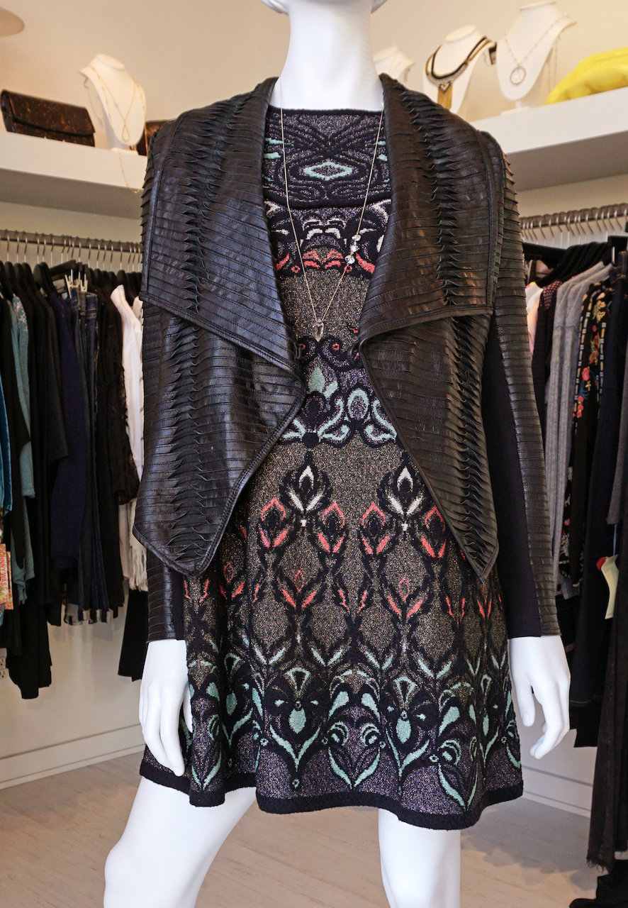 From <a href="https://styleblueprint.com/louisville/guide/peacock-boutique/" target="_blank">Peacock Boutique</a>: Printed sleeveless dress, $905; Slit leather jacket, $675; Necklace, $1,255 From <a href="https://styleblueprint.com/louisville/guide/peacock-boutique/" target="_blank">Peacock Boutique</a>: Printed sleeveless dress, $905; Slit leather jacket, $675; Necklace, $1,255