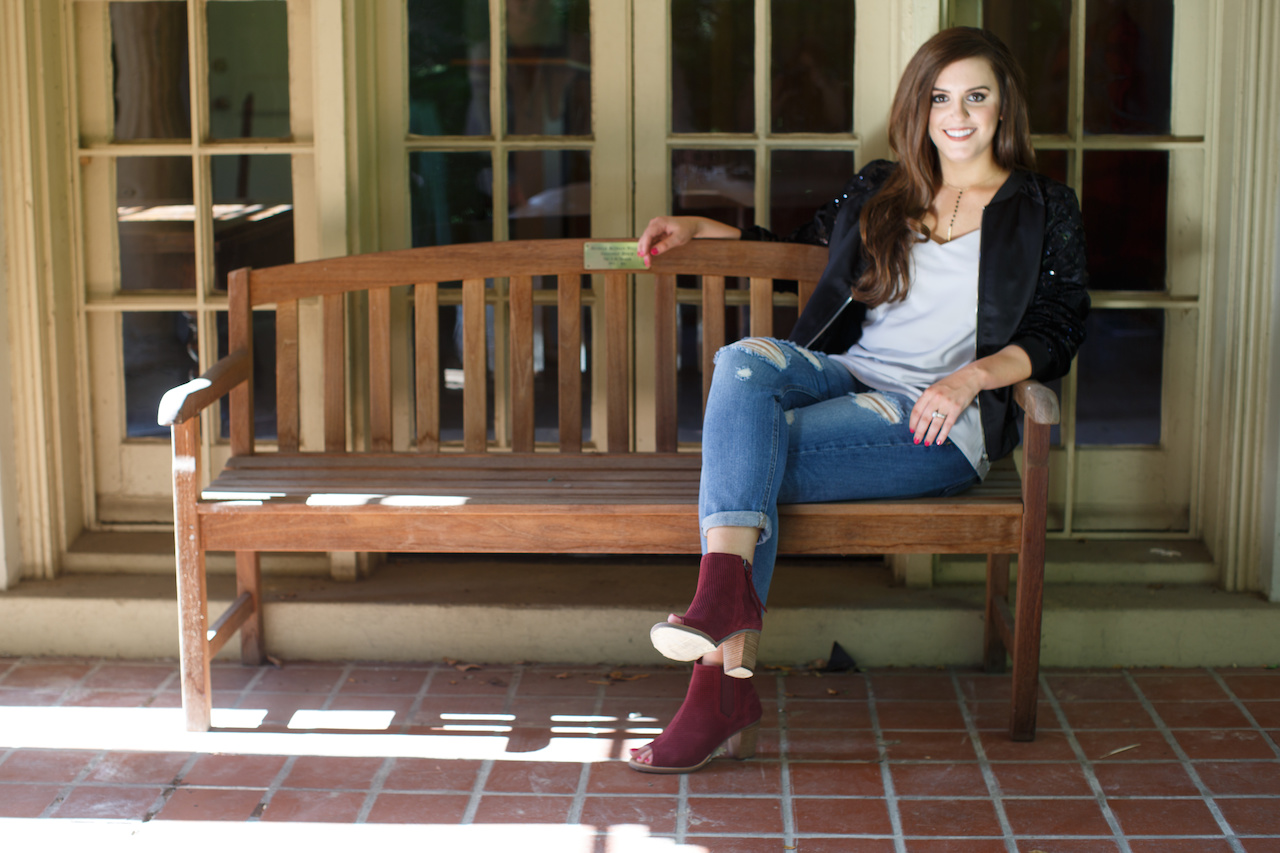 From Sachi, Ashley wears an Endless Rose bomber jacket, $104; Jade by Melody Tam racer-back cami, $38; Joe’s Billie crop jeans, $189; Lincoln necklace by Shira Melody, $34 and Kris Nations ring, $60; Tom’s Majorca peep toe in oxblood perforated suede, $104 and carries an Urban Expressions Ahleigh black vegan leather backpack, $80. From Sachi, Ashley wears an Endless Rose bomber jacket, $104; Jade by Melody Tam racer-back cami, $38; Joe’s Billie crop jeans, $189; Lincoln necklace by Shira Melody, $34 and Kris Nations ring, $60; Tom’s Majorca peep toe in oxblood perforated suede, $104 and carries an Urban Expressions Ahleigh black vegan leather backpack, $80.