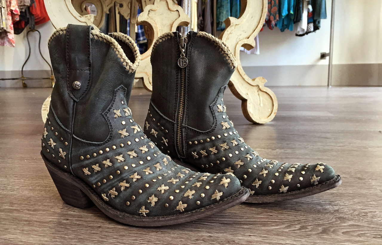 Cowboy boots can up the coolness factor of a look. Tryst Boutique styleblueprint atlanta
