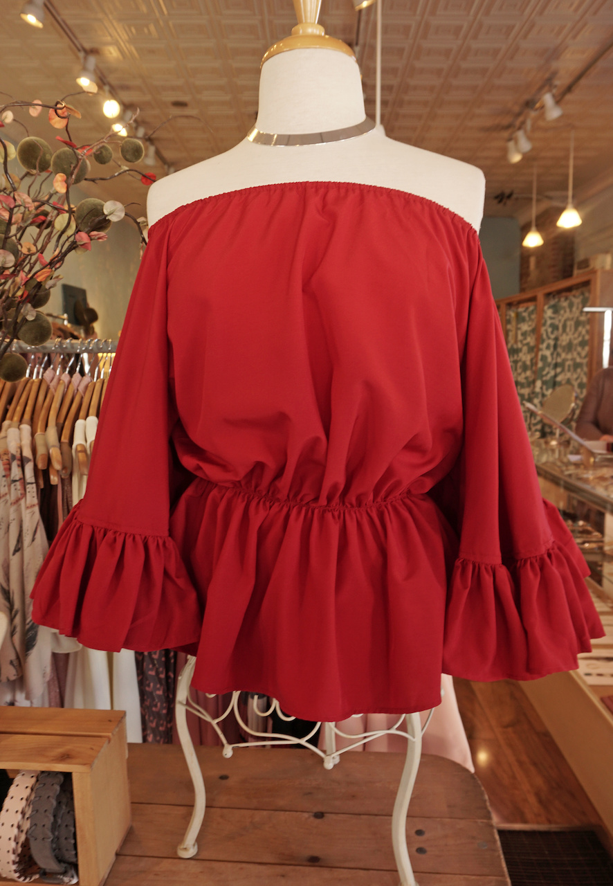 From <a href="https://styleblueprint.com/louisville/guide/general-eccentric/" target="_blank">General Eccentric</a>: Red off-the-shoulder top, $38; Choker, $9 From <a href="https://styleblueprint.com/louisville/guide/general-eccentric/" target="_blank">General Eccentric</a>: Red off-the-shoulder top, $38; Choker, $9
