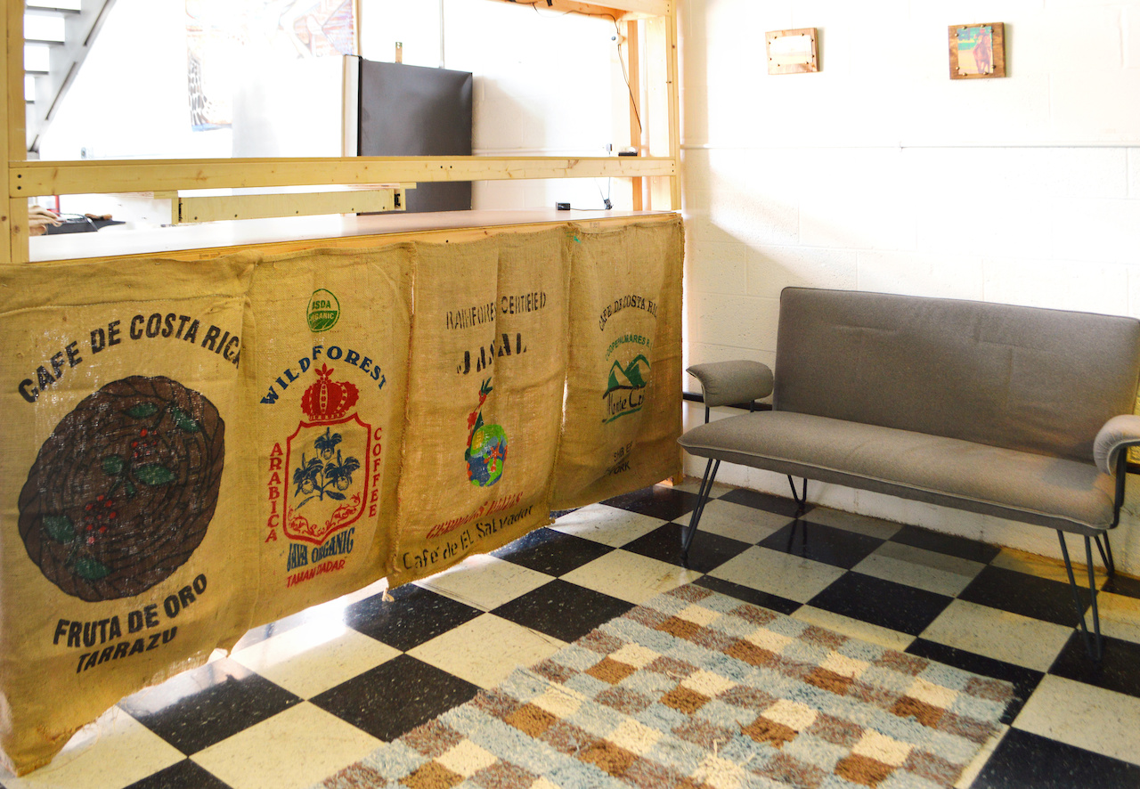 A cozy spot for coffee and conversation at Bean invites customers to sit and stay awhile. A cozy spot for coffee and conversation at Bean invites customers to sit and stay awhile.