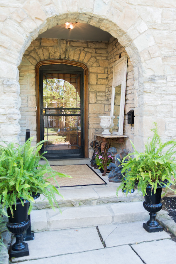 A cozy stone nook of a front porch Take a look inside the Bellarmine Show House 2016