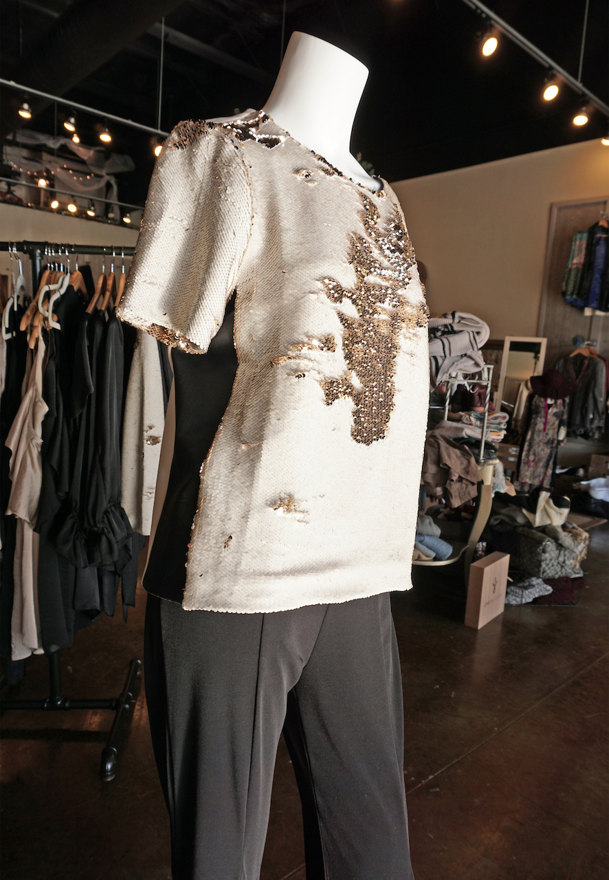 From <a href="https://styleblueprint.com/louisville/guide/blu-boutique/" target="_blank">Blu Boutique</a>: Weston sequin cream gold and black top, $149; Clara sunwoo slacks, $79 From <a href="https://styleblueprint.com/louisville/guide/blu-boutique/" target="_blank">Blu Boutique</a>: Weston sequin cream gold and black top, $149; Clara sunwoo slacks, $79