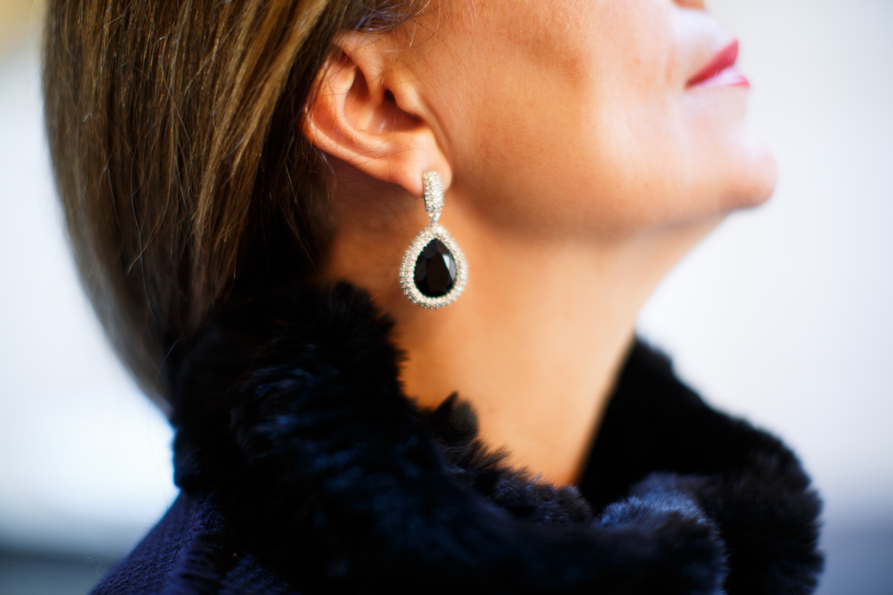 The Jocelyn Black Fur Bib, $165 and and St. John Earrings, $195 add a luxurious and classic accent to Anca's outfit. The Jocelyn Black Fur Bib, $165 and and St. John Earrings, $195 add a luxurious and classic accent to Anca's outfit.