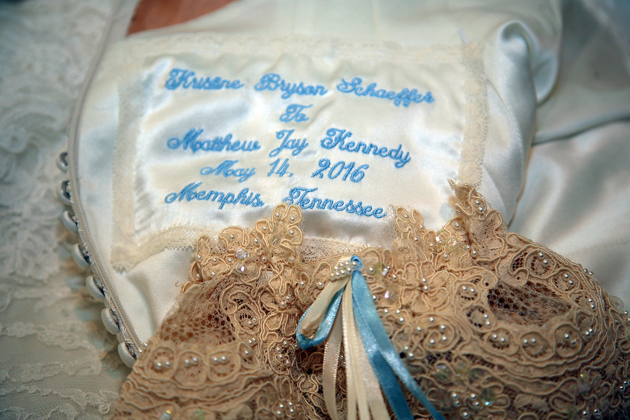 Her garter was something old, borrowed and blue. It was hand made with the lace of her mom’s wedding gown and had a blue ribbon tied into it. She had her dress also embroidered (in blue) with their names, wedding date and wedding location. Her garter was something old, borrowed and blue. It was handmade with the lace of her mom’s wedding gown and had a blue ribbon tied into it. She had her dress also embroidered (in blue) with their names, wedding date and wedding location. Her garter was something old, borrowed and blue. It was hand made with the lace of her mom’s wedding gown and had a blue ribbon tied into it. She had her dress also embroidered (in blue) with their names, wedding date and wedding location. Her garter was something old, borrowed and blue. It was handmade with the lace of her mom’s wedding gown and had a blue ribbon tied into it. She had her dress also embroidered (in blue) with their names, wedding date and wedding location.