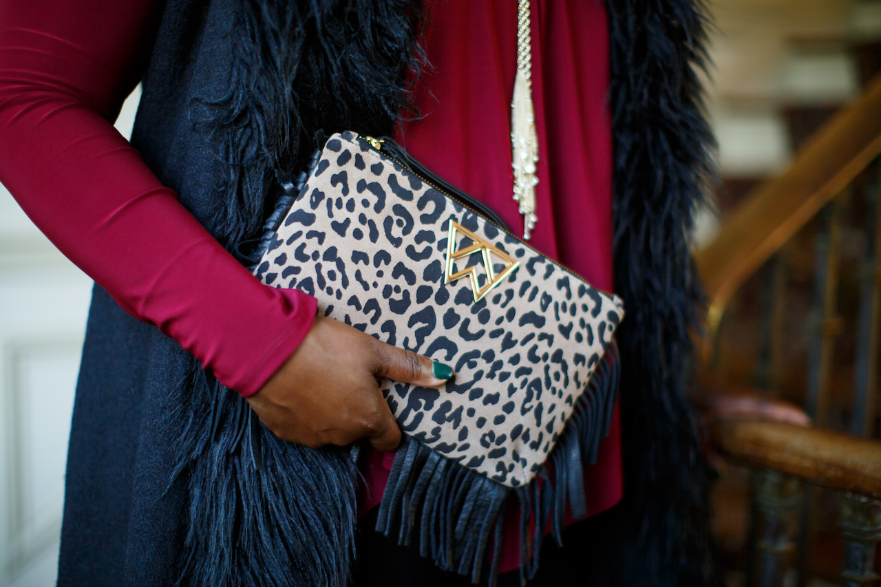 Kendra Scott Sloan lariat necklace, $140; Kelly Wynn Leopard clutch bag $175, from Lansky 126 Kendra Scott Sloan lariat necklace, $140; Kelly Wynn Leopard clutch bag $175, from Lansky 126