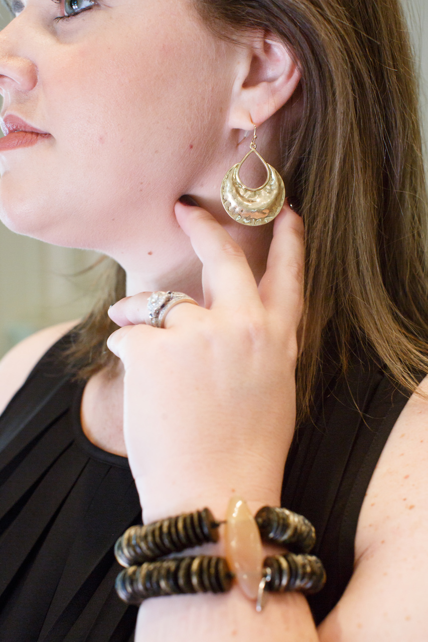 From The Attic, gold earrings, $12; black and gold bracelets with stone, $20 From The Attic, gold earrings, $12; black and gold bracelets with stone, $20