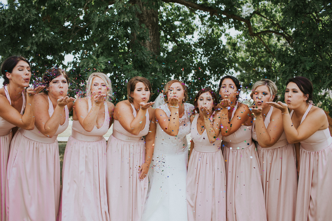 Ashley’s Bridesmaids wore long soft pink dresses from the Vera Wang line at David’s Bridal. Murdock Wedding|styleblueprint.com