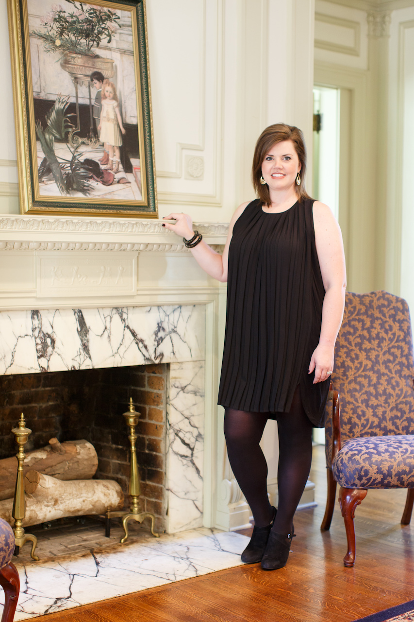 Paired with her own shoes and tights, Amy wears a French Connection pleated black dress, $88; gold earrings, $12; black and gold bracelets with stone, $20 from The Attic. Paired with her own shoes and tights, Amy wears a French Connection pleated black dress, $88; gold earrings, $12; black and gold bracelets with stone, $20 from The Attic.