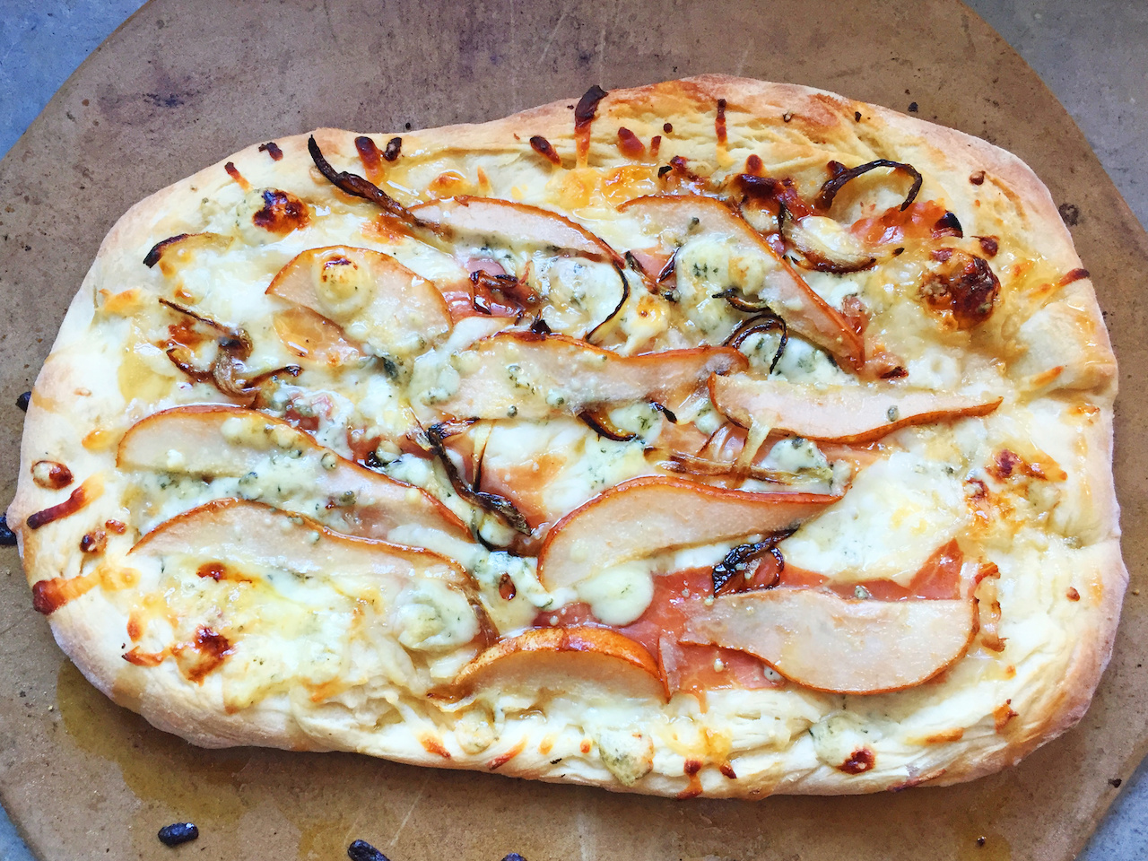Sweet pears and honey mix with savory gorgonzola cheese and prosciutto for a pizza party in your mouth! Sweet pears and honey mix with savory gorgonzola cheese and prosciutto for a pizza party in your mouth!