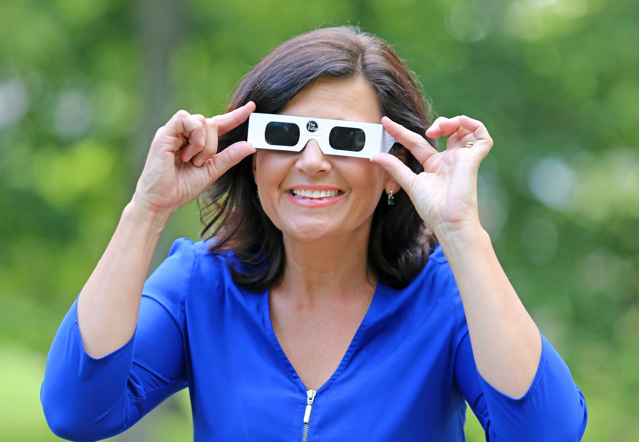 Janet's never without a hefty supply of eclipse safety glasses, and she's quick to share them with anyone she meets. Janet's never without a hefty supply of eclipse safety glasses, and she's quick to share them with anyone she meets.