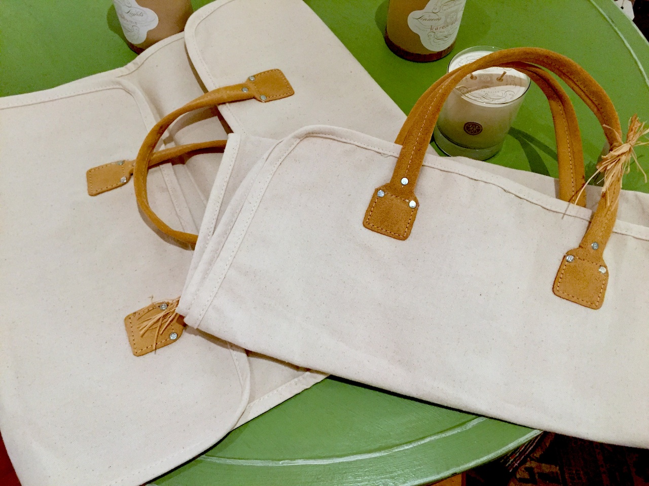 Canvas and suede log carrier, $18 at Palladio Interiors Canvas and suede log carrier, $18 at Palladio Interiors