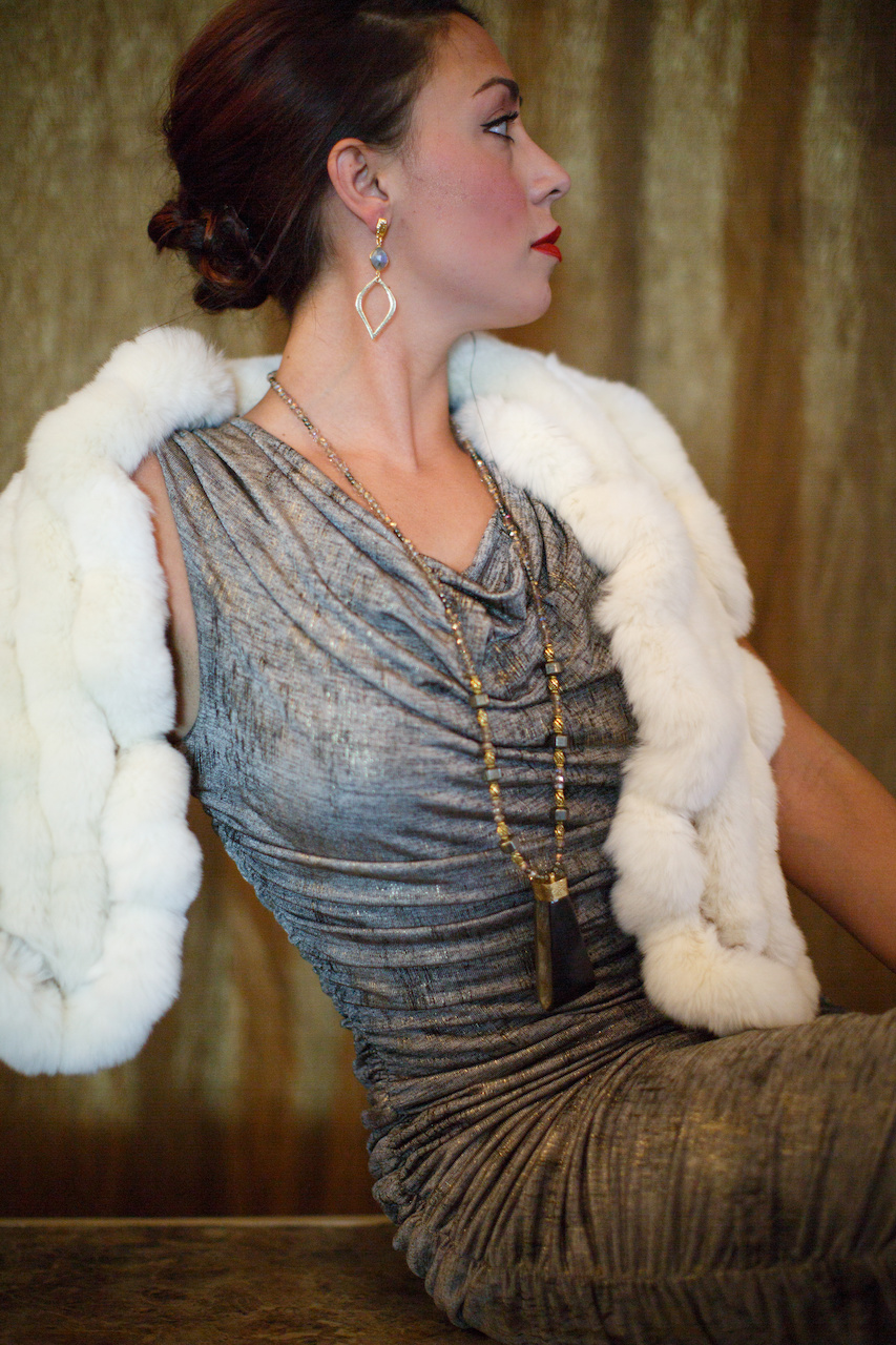 Necklace, $179 and earrings, $79; fur scarf, $169 Necklace, $179 and earrings, $79; fur scarf, $169