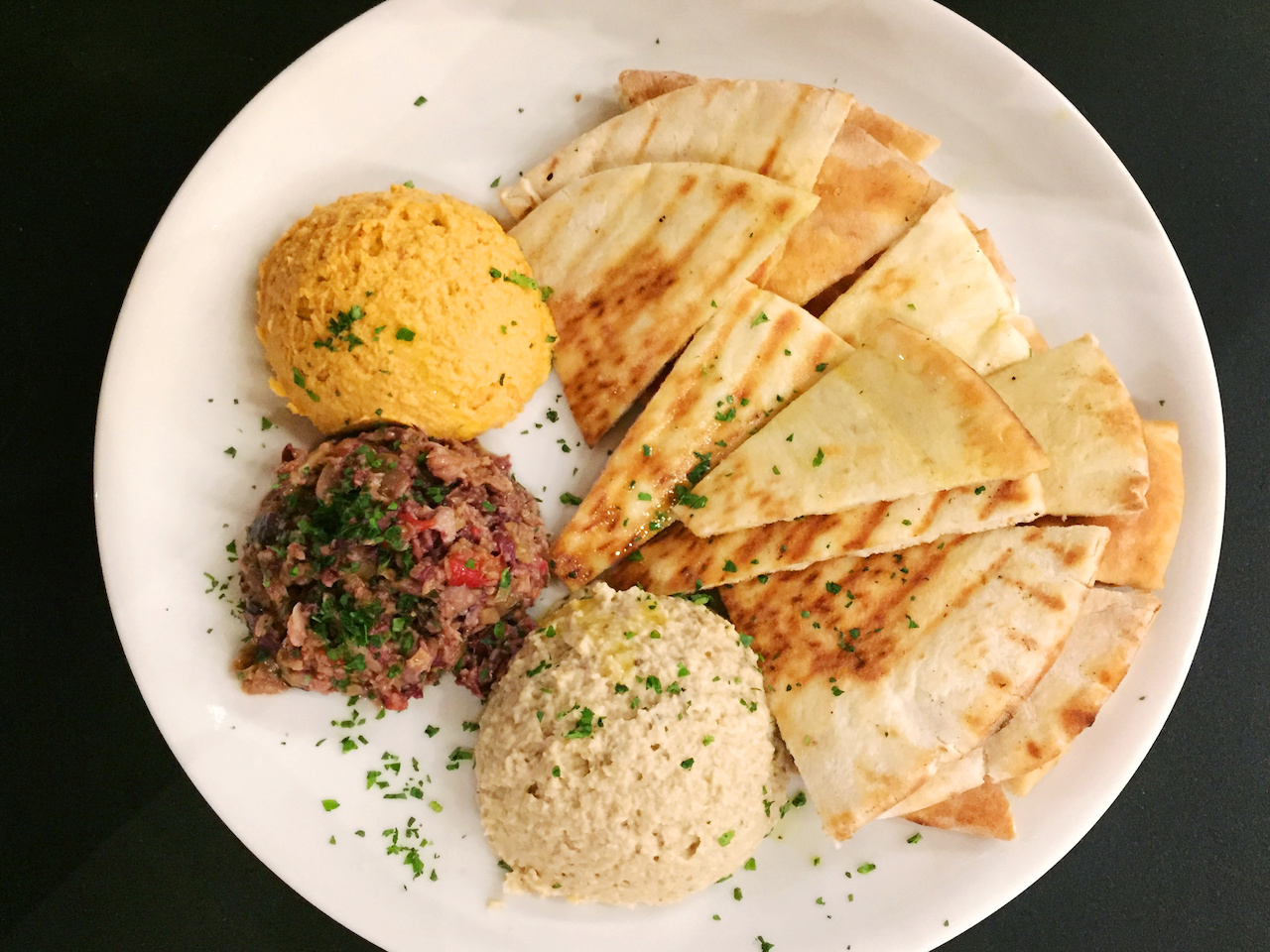 Any condiment will taste delicious on that pita bread. sb-atl-citywinery-trio-horiz.JPG