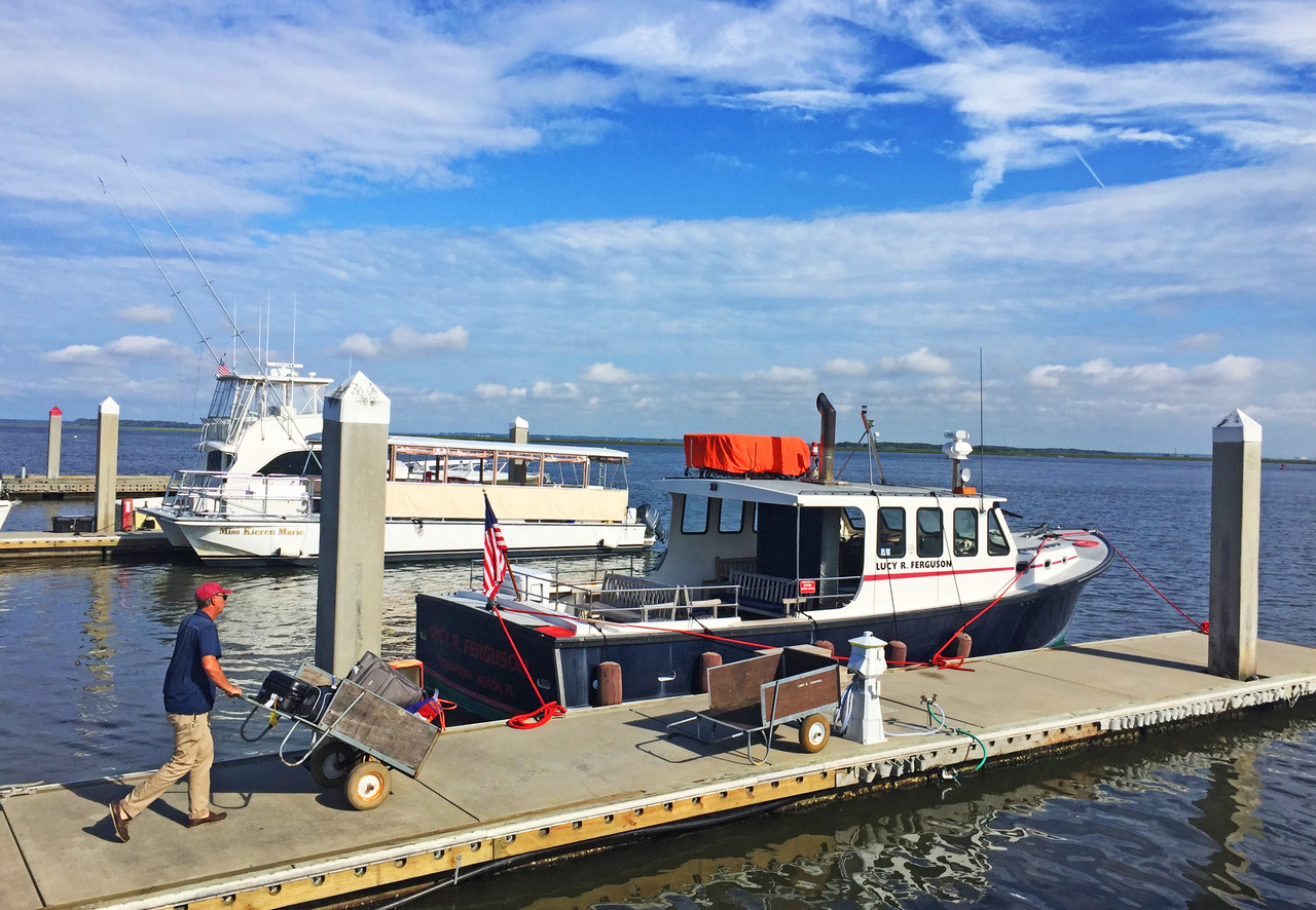 Guests to the Greyfield drop their luggage off at the dock in Fernandina Beach, Florida, then hop on the 40-minute ferry provided by the inn. Guests to the Greyfield drop their luggage off at the dock in Fernandina Beach, Florida, then hop on the 40-minute ferry provided by the inn.