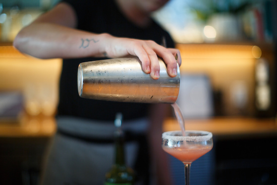 The signature cocktail, a house-infused lemon vodka and pomegranate concoction. The signature cocktail, a house-infused lemon vodka and pomegranate concoction.