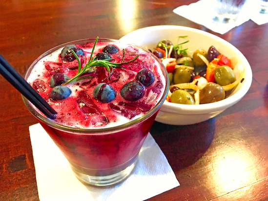 The gorgeous and tangy Mondo cocktail ($10) and a small plate of greek olives and peppers ($6) at Ecco. The gorgeous and tangy Mondo cocktail ($10) and a small plate of greek olives and peppers ($6) at Ecco.