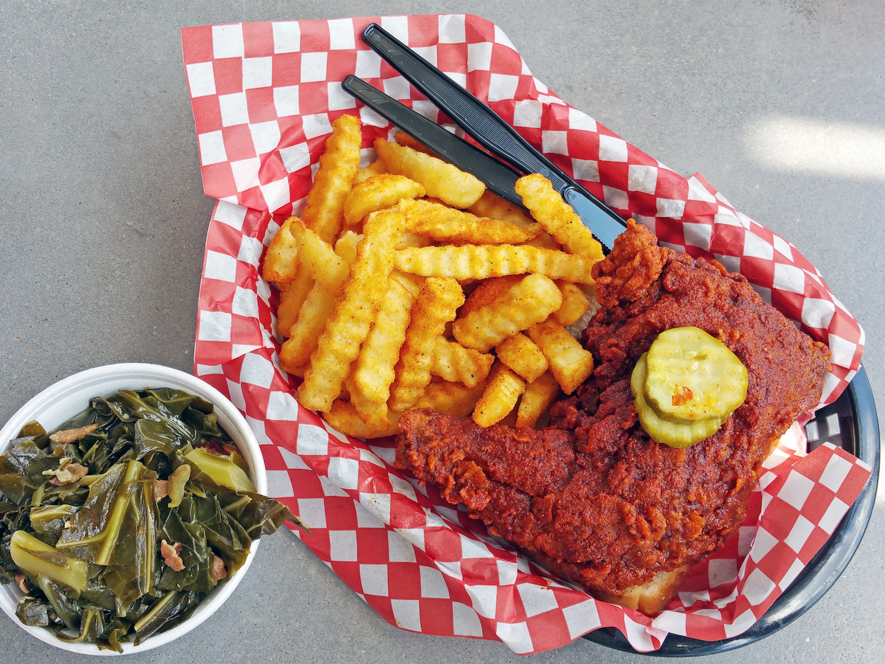 Hattie B's Hot Chicken Plate with french fries and Southern Greens is the perfect comfort meal. Hattie B's Hot Chicken Plate with french fries and Southern Greens is the perfect comfort meal.