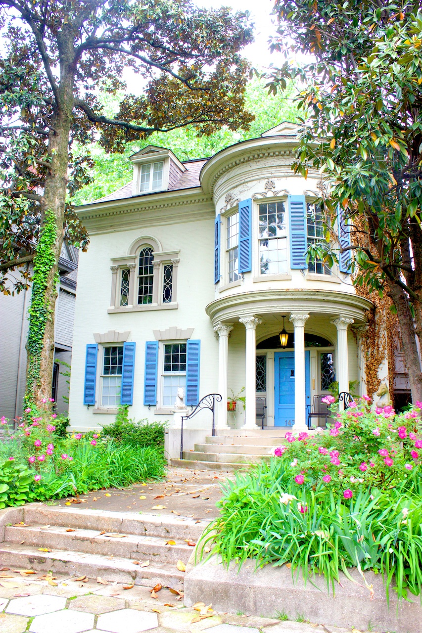 Robin's Egg blue shutters are the standout detail on this house. walking old louisville