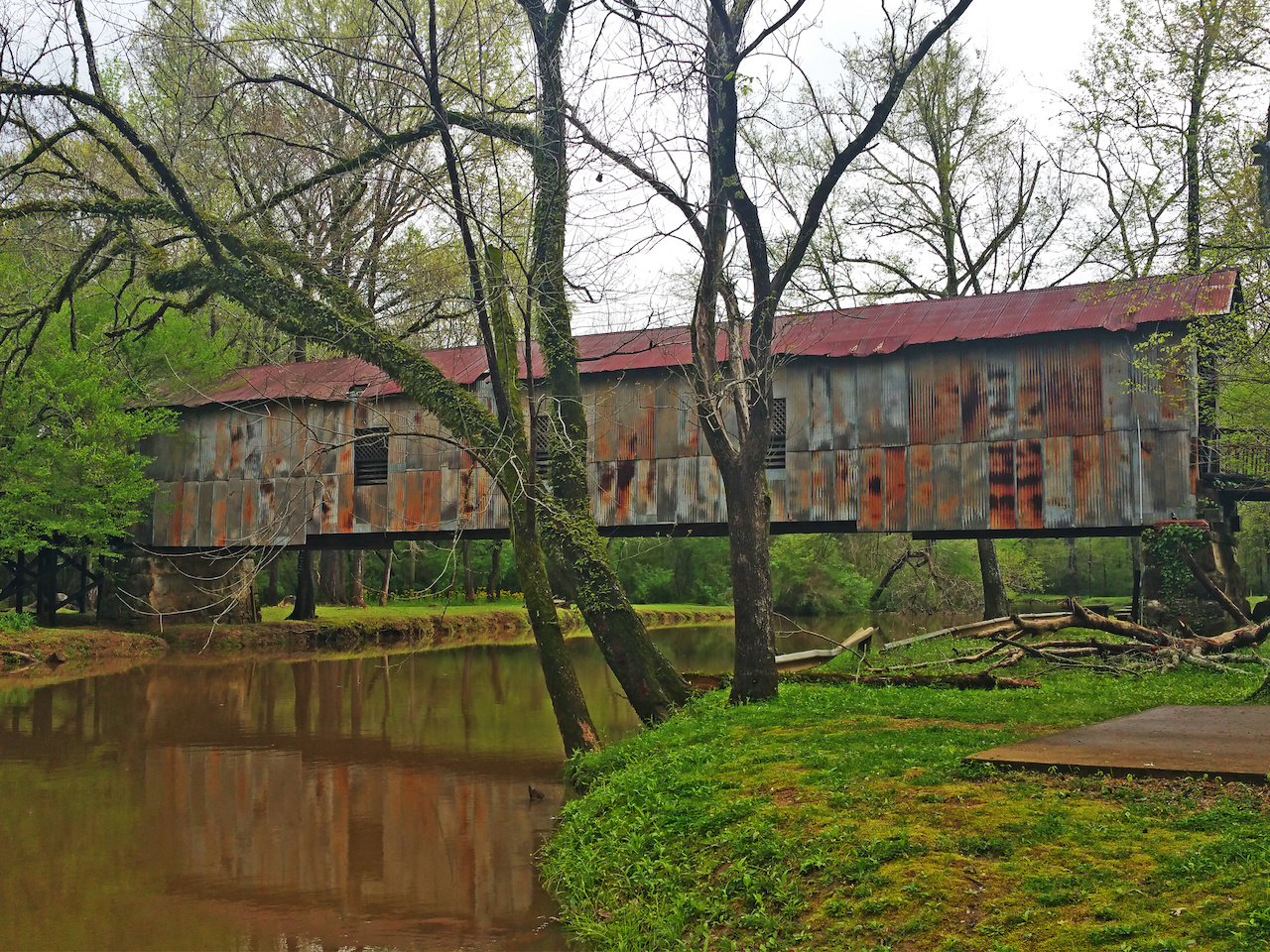 The Kymulga Bridge stretches 105 feet across the Talladega Creek. The Kymulga Bridge stretches 105 feet across the Talladega Creek.