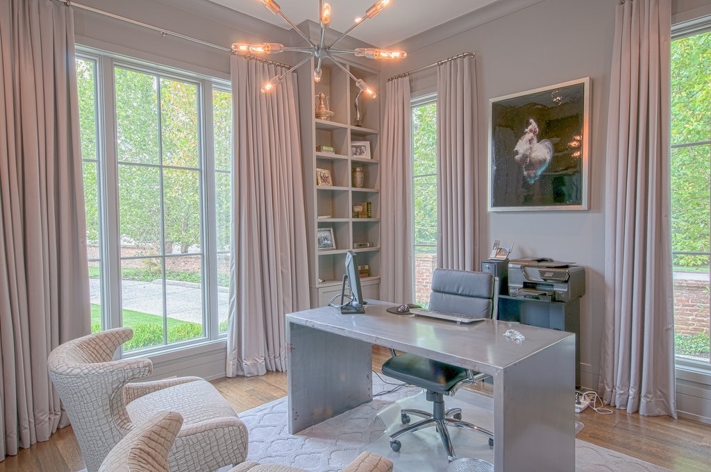 This is the home office Leslie designed for her husband, with one of her favorite photographs, 'Angel' by Zena Holloway. Image| Kathryn Willis. This is the home office Leslie designed for her husband, with one of her favorite photographs, 'Angel' by Zena Holloway. Image| Kathryn Willis.