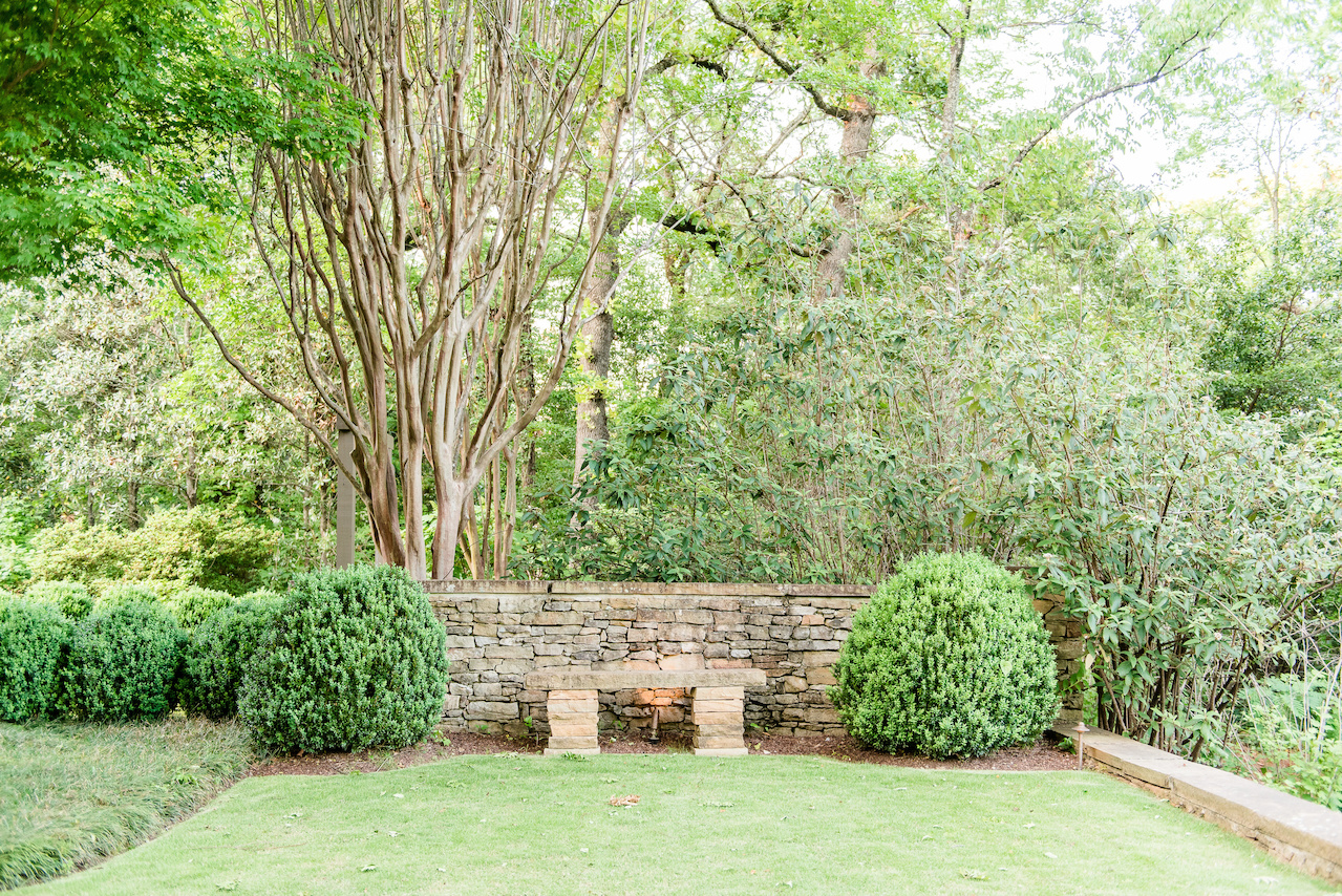 Close to the house, the hard edges of brick and stone bordered in mondo or lawn give way to gravel paths and irregular stone walkways as one meanders farther from the home. Close to the house, the hard edges of brick and stone bordered in mondo or lawn give way to gravel paths and irregular stone walkways as one meanders farther from the home.