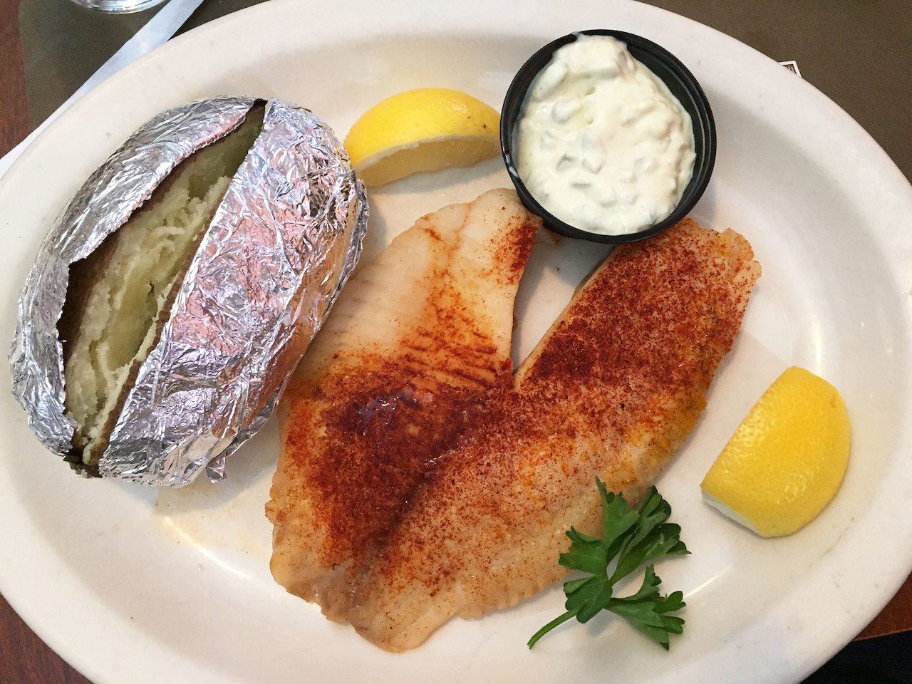 Besides the fried chicken, there are some other really great items on the menu. The tilapia is so good and comes with a choice of two sides: I went with the baked potato and the cucumber salad (which was devoured in under 1 minute).