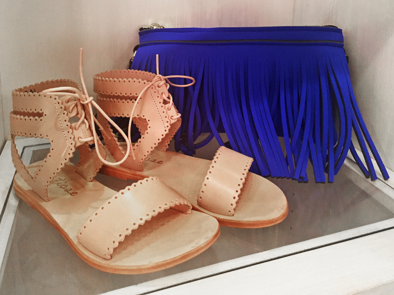 From Theadora Abbeyluxe: Matisse tan sandal, $75; Hippy blue clutch, $118 From Theadora Abbeyluxe: Matisse tan sandal, $75; Hippy blue clutch, $118
