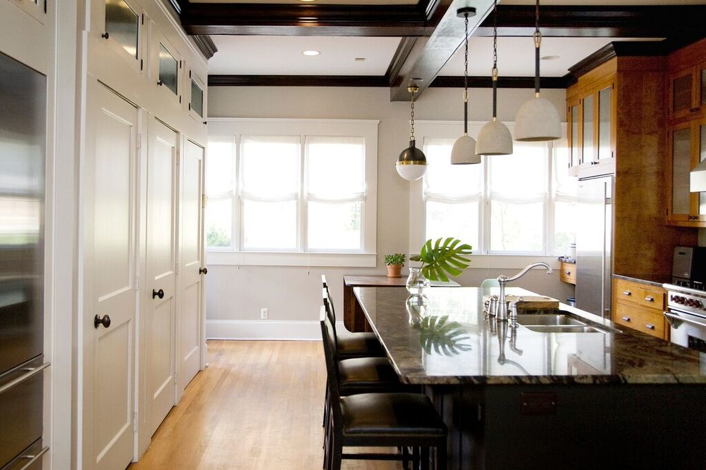 A pop of color from the live plants breaks up the space. StyleBlueprint Atlanta: Kate Hayes Midtown design