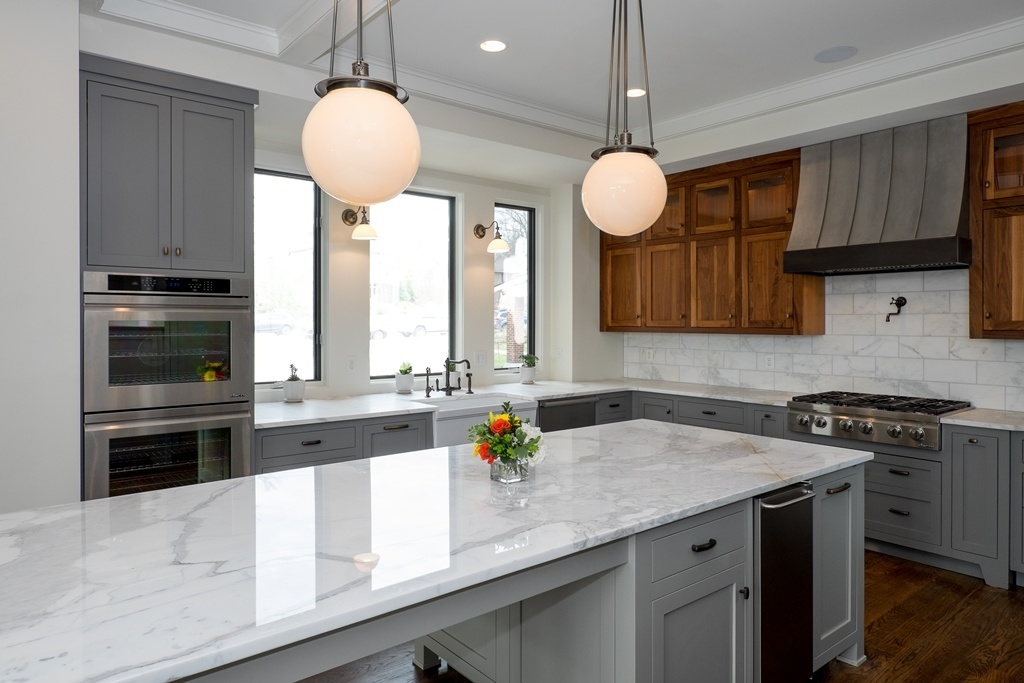 We love how this range is framed by rich, wood cabinets We love how this range is framed by rich, wood cabinets