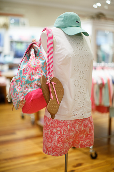 From Vineyard Vines: Pink shell-patterned shorts, $98; sleeveless eyelet top, $98; pink bow flip flops, $49.50; sea mist logo hat, $28 and a striped print day pack, $98. From Vineyard Vines: Pink shell-patterned shorts, $98; sleeveless eyelet top, $98; pink bow flip flops, $49.50; sea mist logo hat, $28 and a striped print day pack, $98.