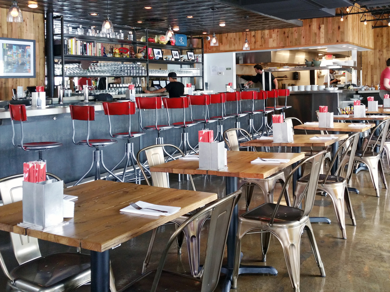 Metal, concrete and wood combine to create the hip interiors at wooden goat. Metal, concrete and wood combine to create the hip interiors at wooden goat.
