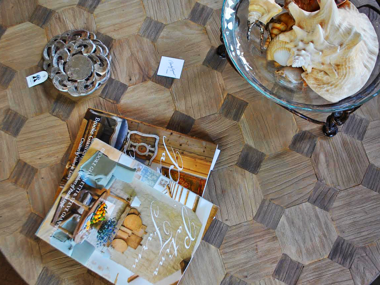 A coffee table vignette offers warmth and charm. A coffee table vignette offers warmth and charm.