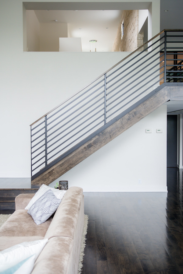 a minimal view down From a Fallaway Lot to a Dream House