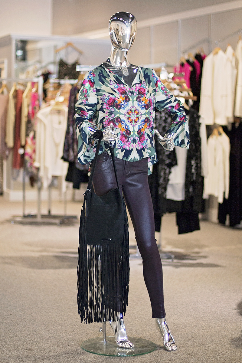 From Heather: Camouflage and kaleidoscope floral print silk top from Nicole Miller, $275; Paige luxe coated skinny jeans in wine, $220; Stevie suede fringe bag, $198; Pindi House mixed metals 1940's shoe clip necklace, $92 From Heather: Camouflage and kaleidoscope floral print silk top from Nicole Miller, $275; Paige luxe coated skinny jeans in wine, $220; Stevie suede fringe bag, $198; Pindi House mixed metals 1940's shoe clip necklace, $92