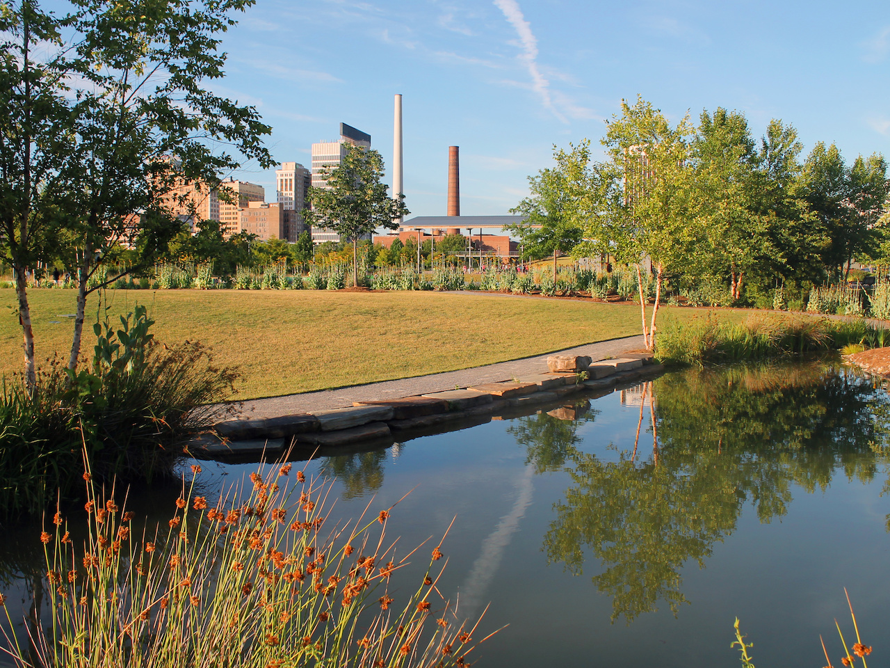 A tranquil scene at Railroad Park on a sunny afternoon A tranquil scene at Railroad Park on a sunny afternoon