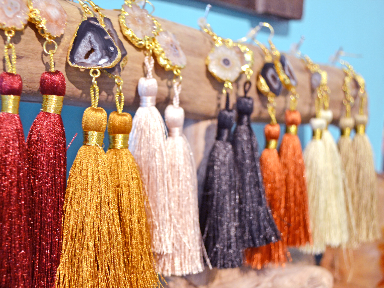 For only $35, this is an inexpensive way to dress up any outfit. Agate and tassel earrings at Revelry Boutique Gallery