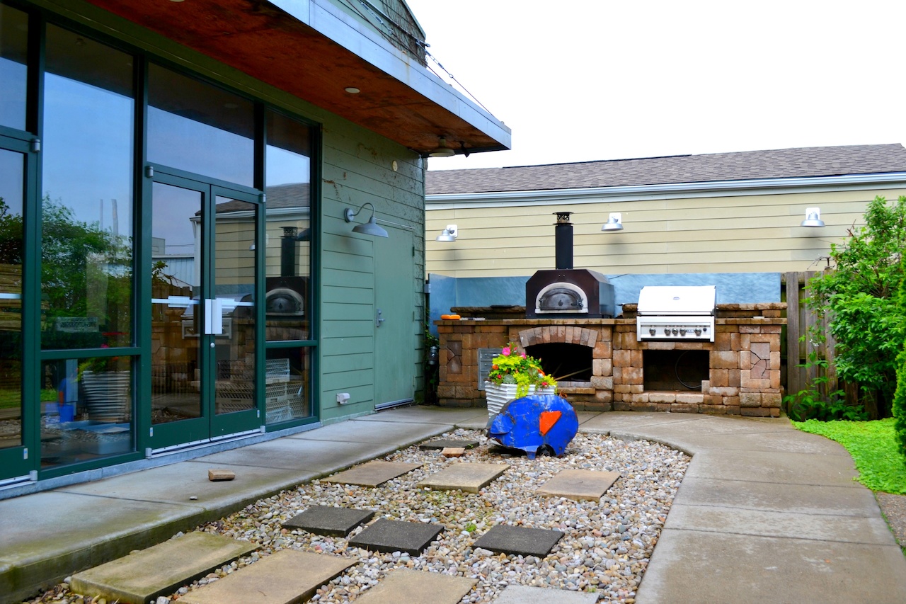 The Wine Studio at 610 Magnolia has a private room with a kitchen and an outside patio complete with wood burning oven. sb great event spaces 610 magnolia wine studio.jpg