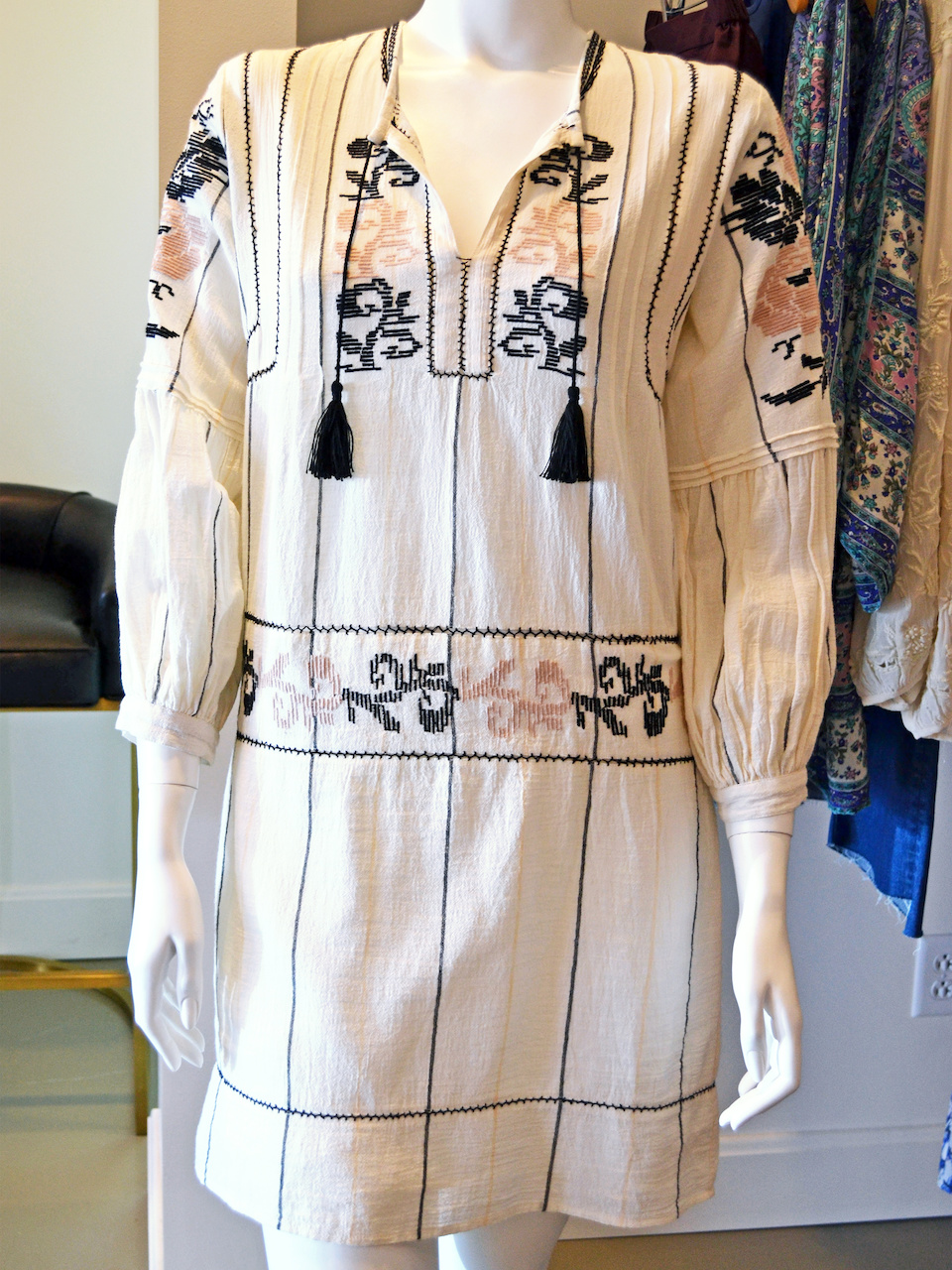 This is long sleeved but very cool because of the fabric Boho chic with long sleeves and great tassel top closure.
