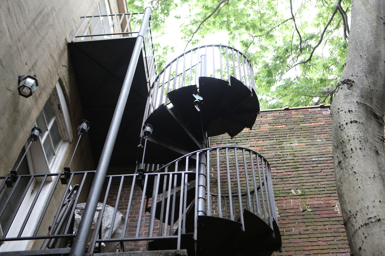 We wandered out into a courtyard just off a shop and discovered this three-story spiral staircase seemingly going straight up into the sky. We wandered out into a courtyard just off a shop and discovered this three-story spiral staircase seemingly going straight up into the sky.
