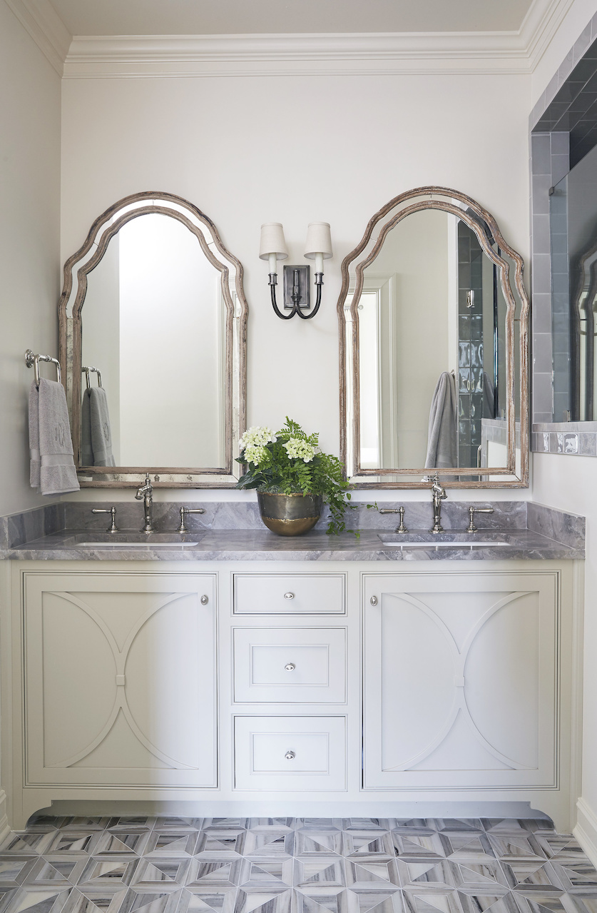 "You can always dress up your cabinets by adding a design on front of doors," says Libby. The floors are a geometric mosaic honed marble from Fixtures and Finishes. "You can always dress up your cabinets by adding a design on front of doors," says Libby. The floors are a geometric mosaic honed marble from Fixtures and Finishes.