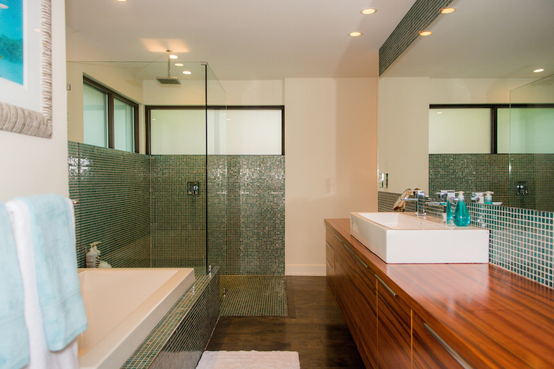 green glass tiles all through shower and backsplash From a Fallaway Lot to a Dream House