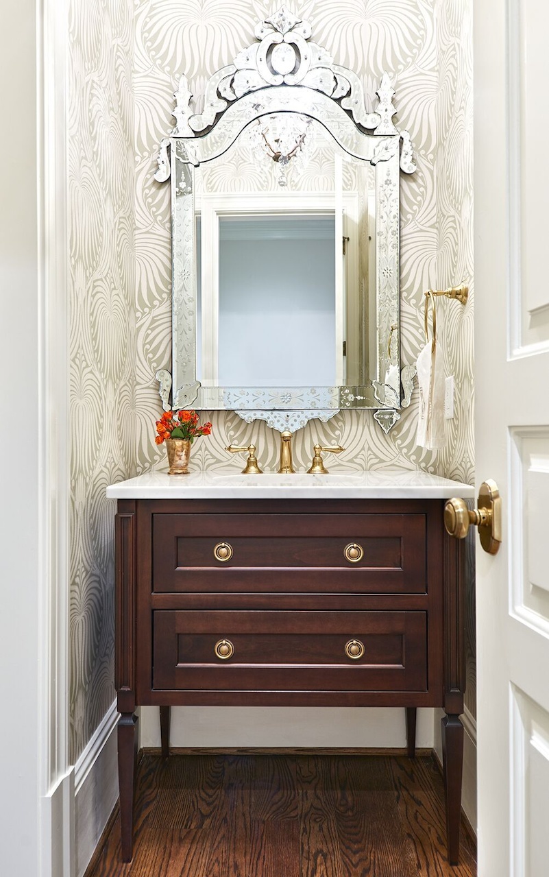 Farrow and Ball wallpaper livens up the powder room. Farrow and Ball wallpaper livens up the powder room.