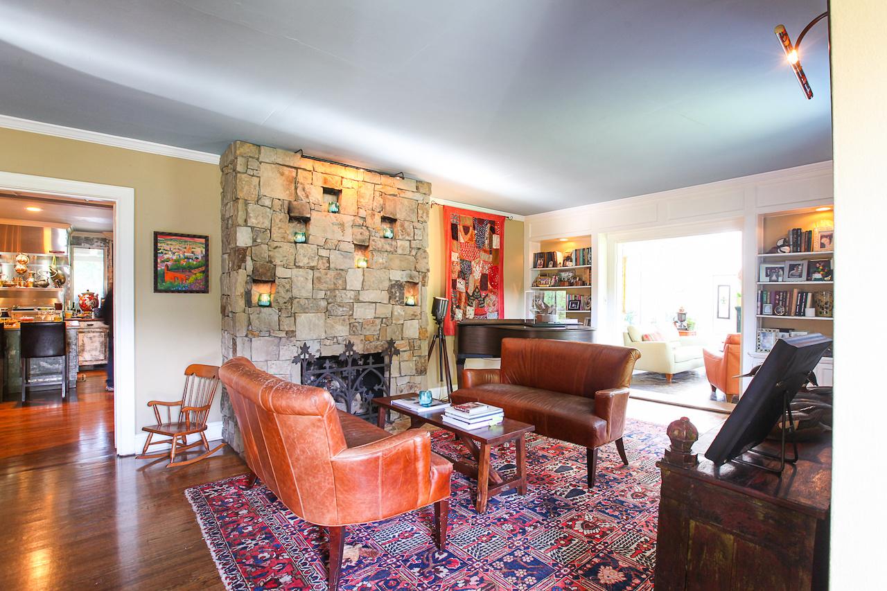 Upon entering, you can't help but notice the stone fireplace with little indentions to hold candles.