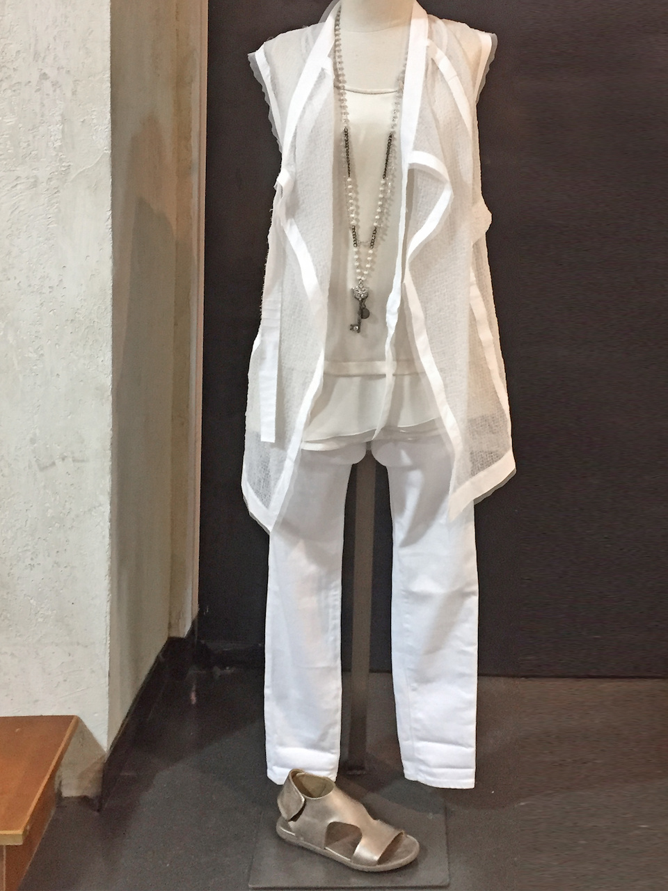 From Betsy Prince: Demoo white sleeveless vest, $438; AG Farrah Skinny jean in white, $178; Rocco Ragni cream sleeveless top, $330 From Betsy Prince: Demoo white sleeveless vest, $438; AG Farrah Skinny jean in white, $178; Rocco Ragni cream sleeveless top, $330