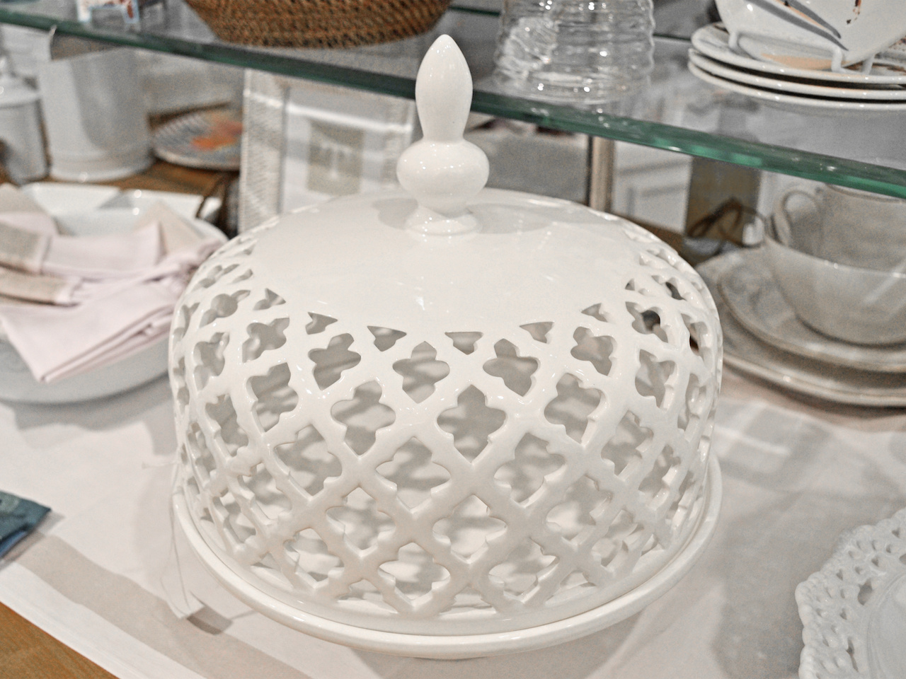 Let's you smell your cake through the top! Covered cake plate at Dolfinger's